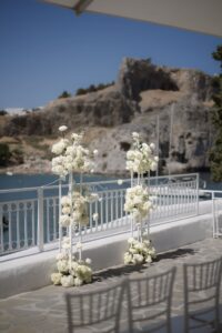 Romantic destination wedding on Rhodes, Greece, photographed in Lindos St Paul Bay