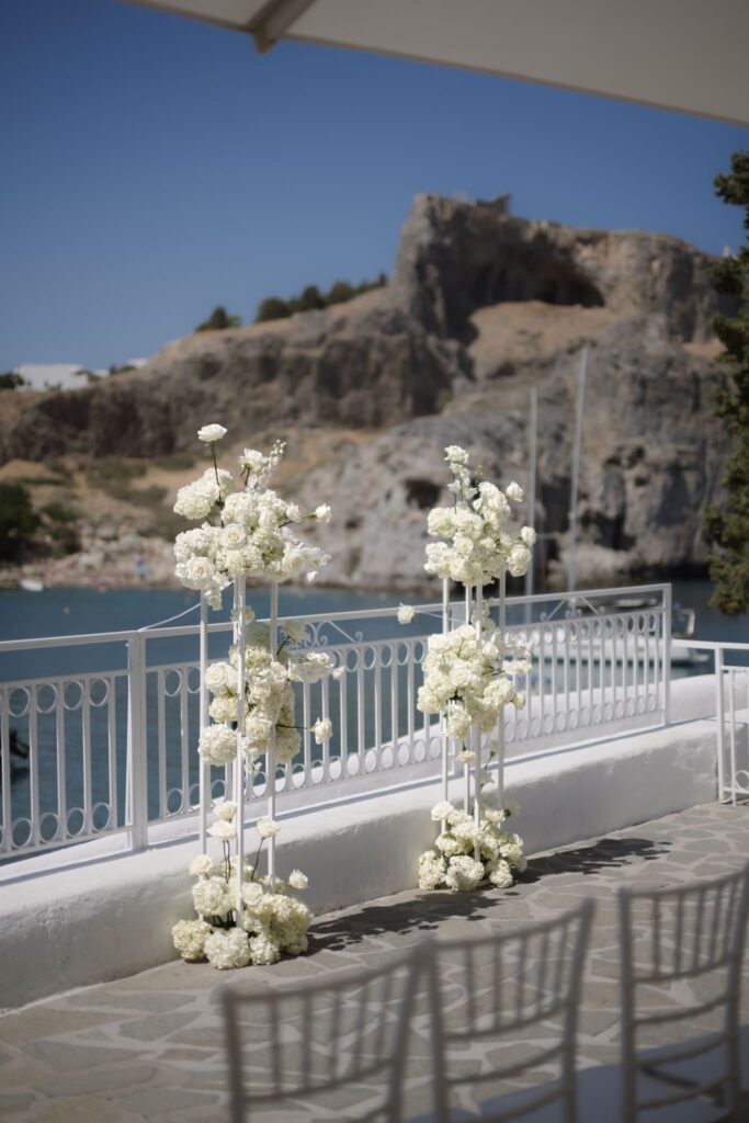 Romantic destination wedding on Rhodes, Greece, photographed in Lindos St Paul Bay