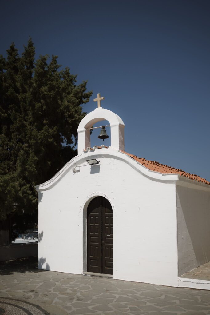 Romantic destination wedding on Rhodes, Greece, photographed in Lindos St Paul Bay