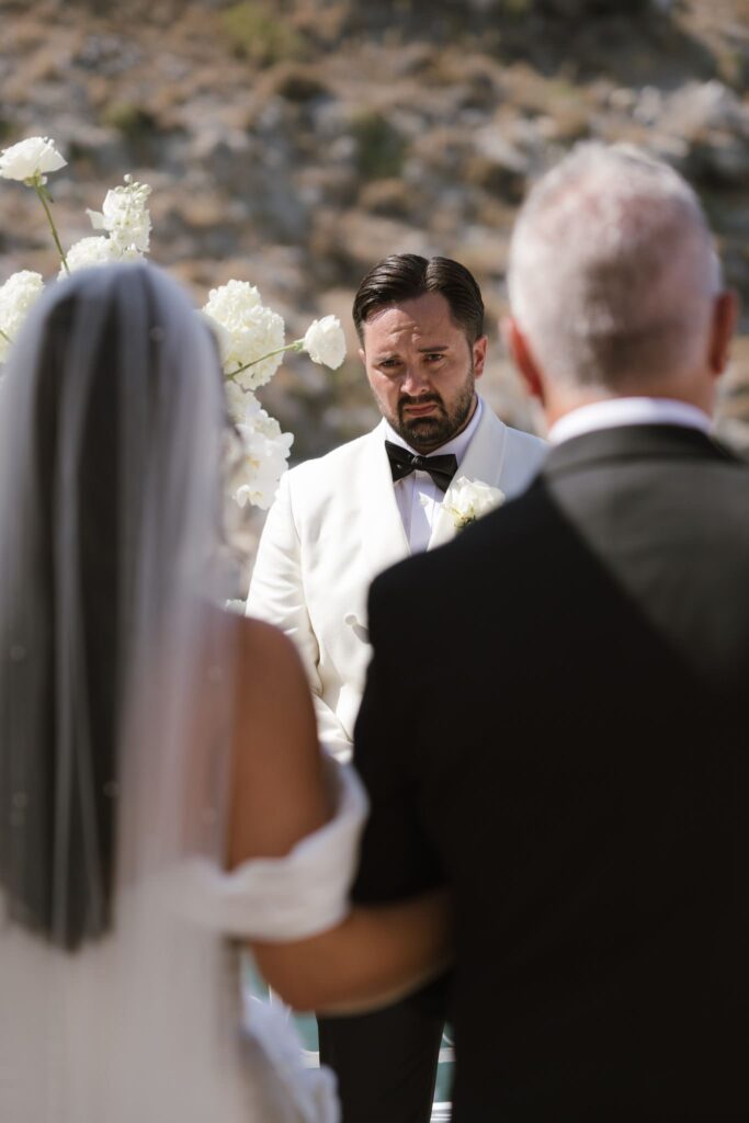 Romantic destination wedding on Rhodes, Greece, photographed in Lindos St Paul Bay