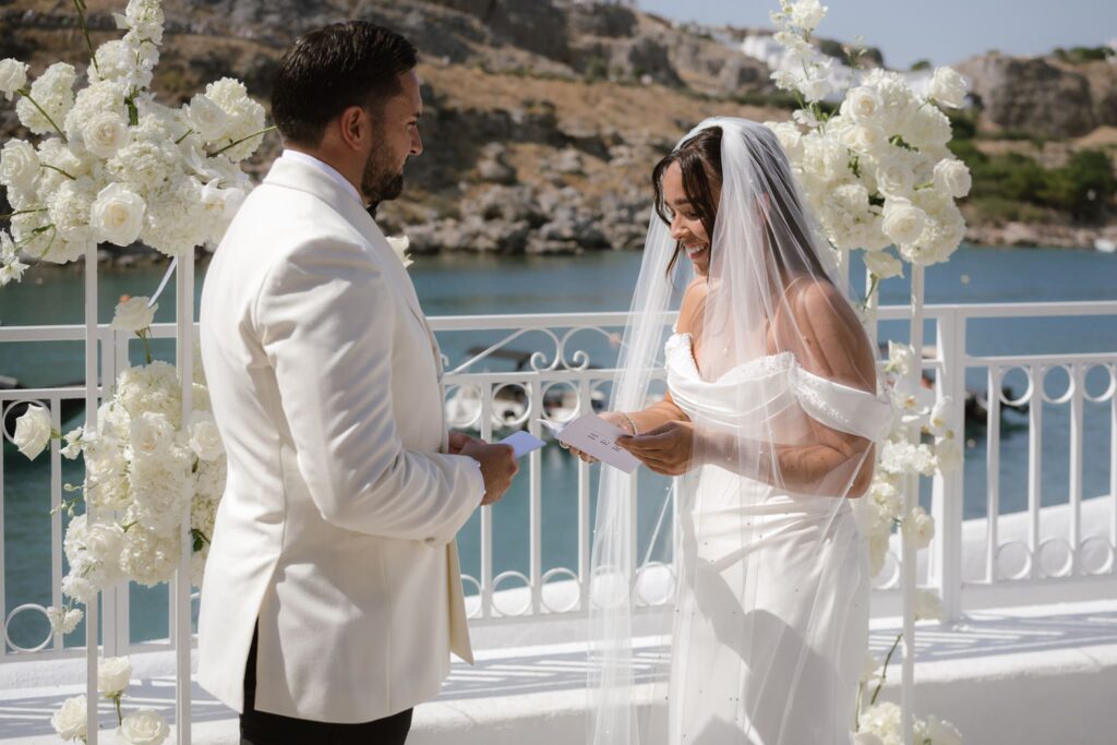 Romantic destination wedding on Rhodes, Greece, photographed in Lindos St Paul Bay