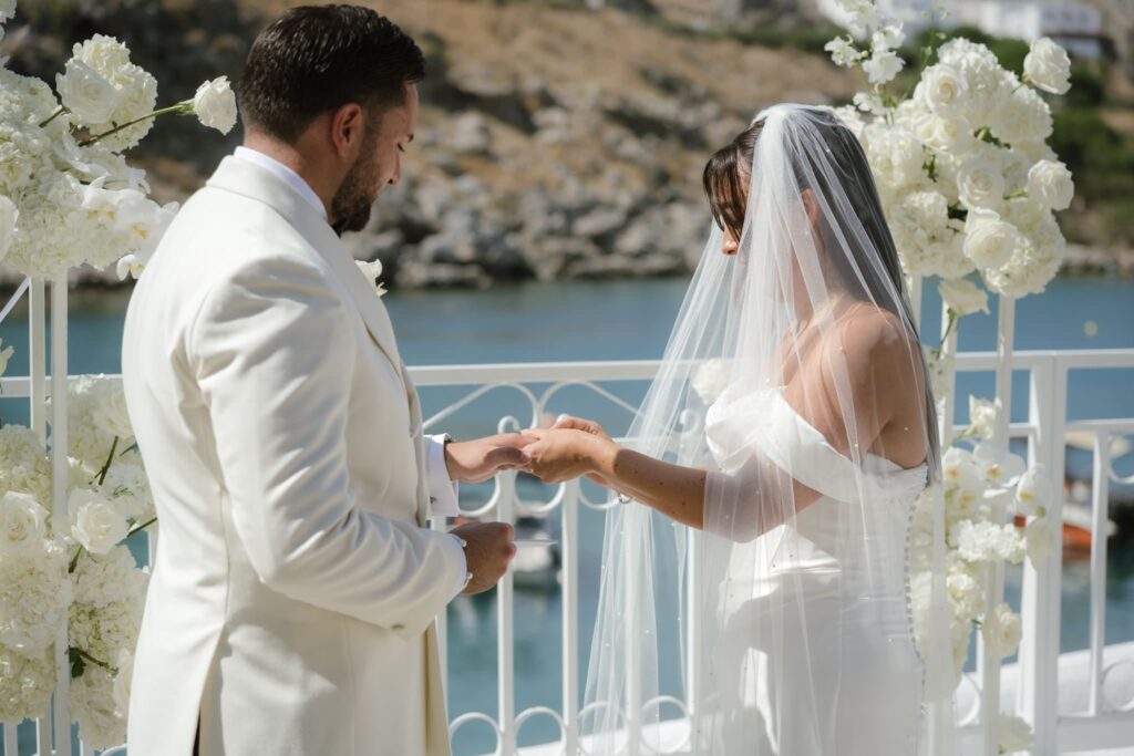 Romantic destination wedding on Rhodes, Greece, photographed in Lindos St Paul Bay