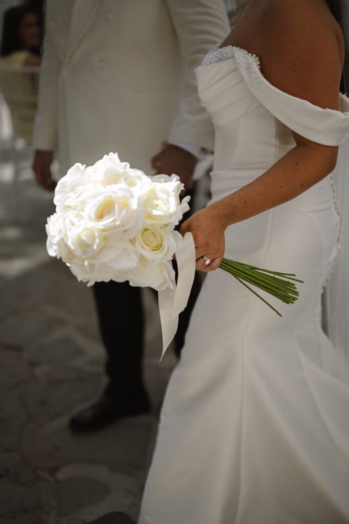 Romantic destination wedding on Rhodes, Greece, photographed in Lindos St Paul Bay