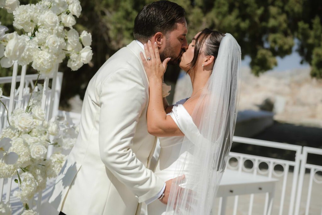 Romantic destination wedding on Rhodes, Greece, photographed in Lindos St Paul Bay