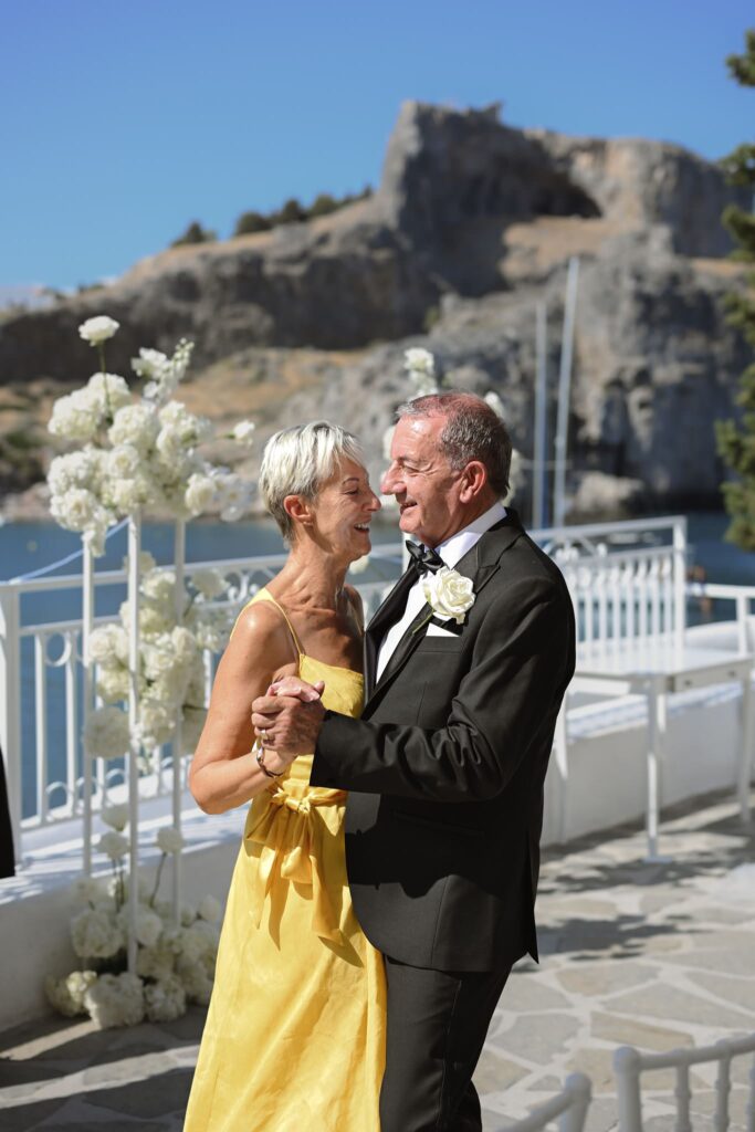 Romantic destination wedding on Rhodes, Greece, photographed in Lindos St Paul Bay