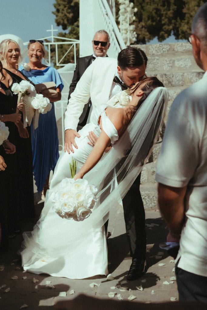 Romantic destination wedding on Rhodes, Greece, photographed in Lindos St Paul Bay