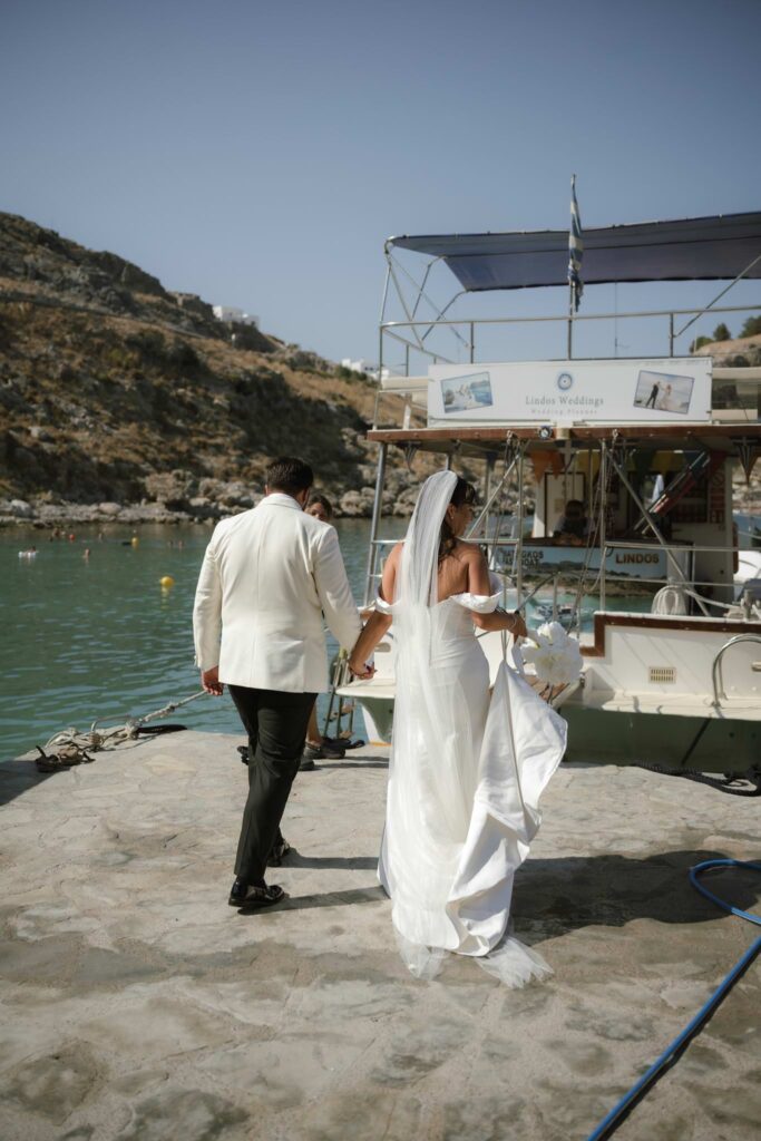 Romantic destination wedding on Rhodes, Greece, photographed in Lindos St Paul Bay