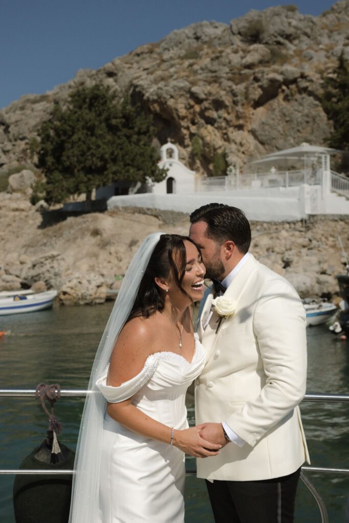 Romantic destination wedding on Rhodes, Greece, photographed in Lindos St Paul Bay