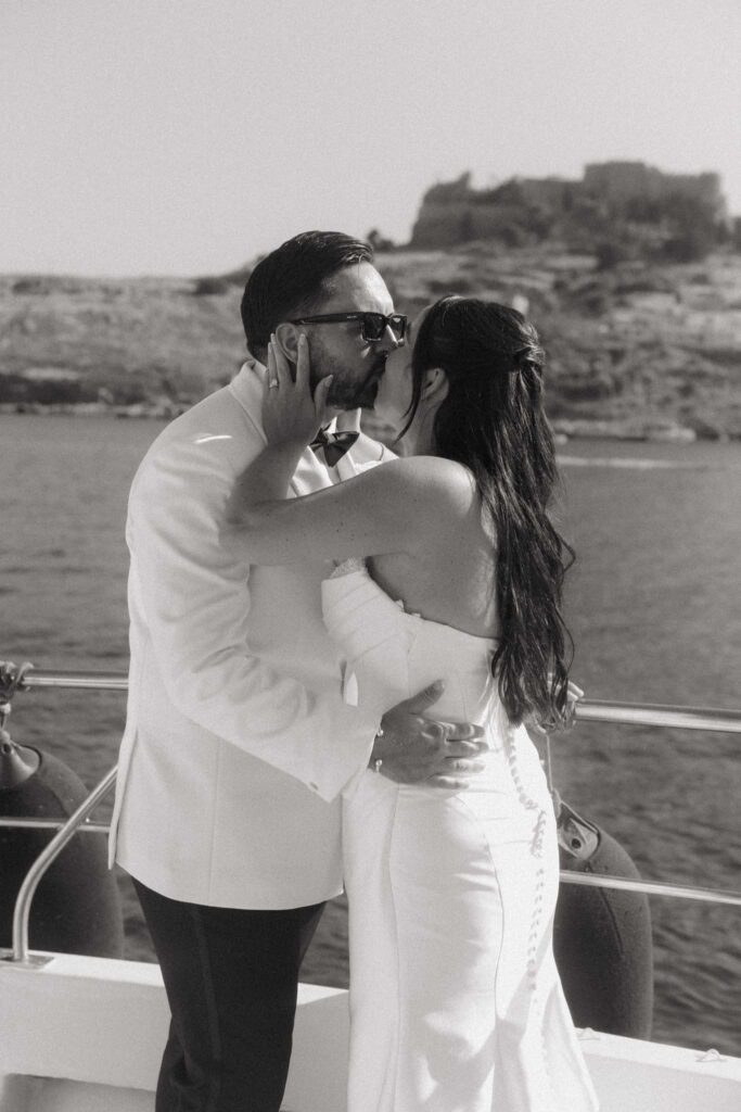 Romantic destination wedding on Rhodes, Greece, photographed in Lindos St Paul Bay