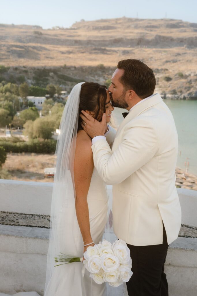 Romantic destination wedding on Rhodes, Greece, photographed in Lindos Skala
