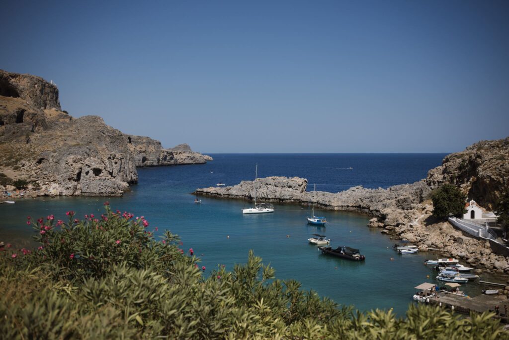 Romantic destination wedding on Rhodes, Greece, photographed in Lindos St Paul Bay